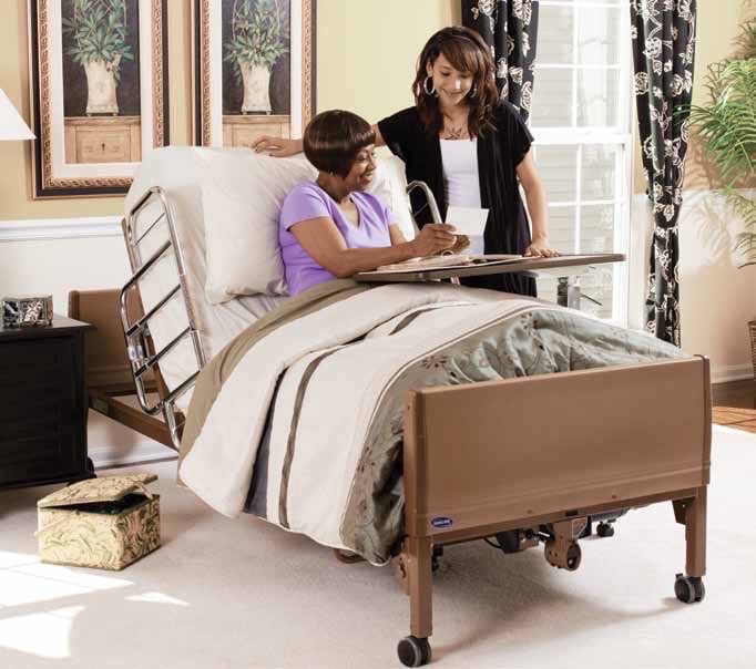 Invacare C Bed with lady working