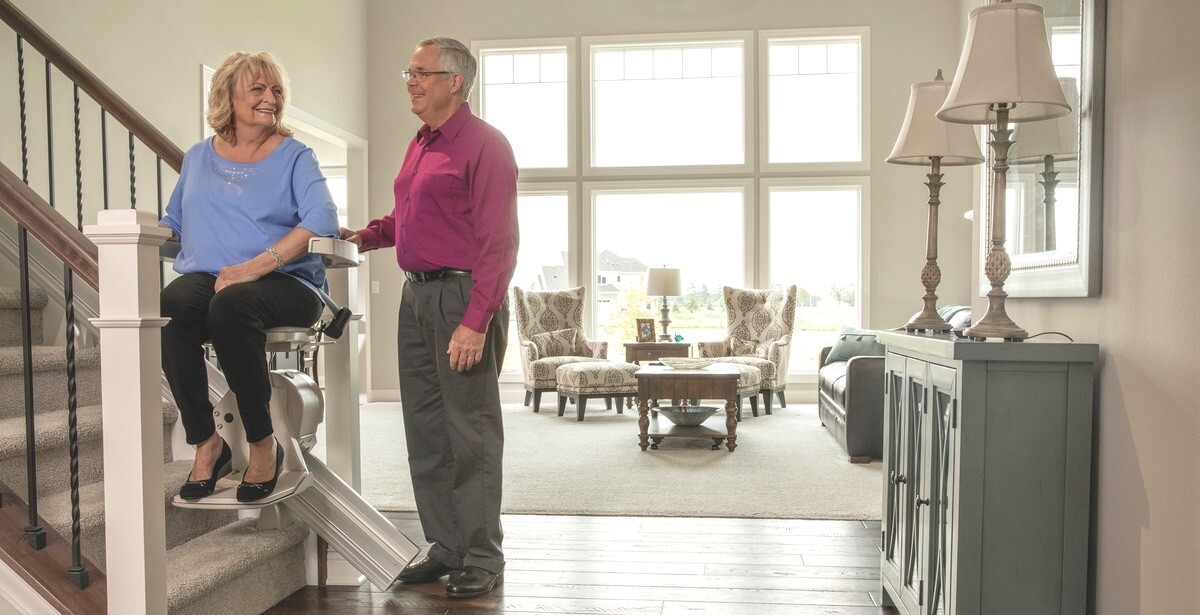 couple using bruno stair lift