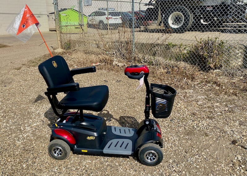 Buzzaround mobility scooter on rough road