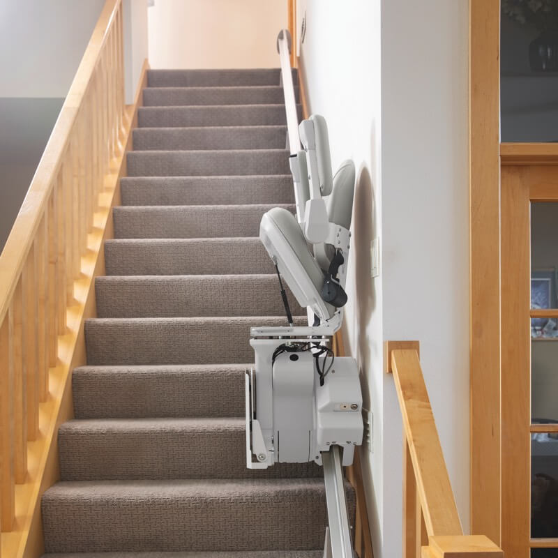 stairlift-on-rail-in-stairway