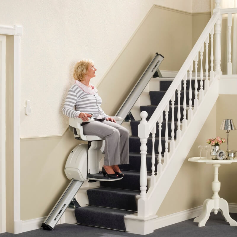 lady going up on stairlift