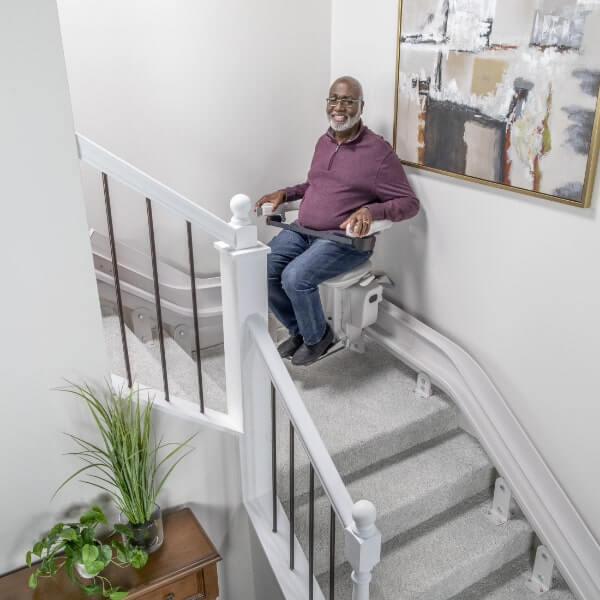 looking down at man on stair lift