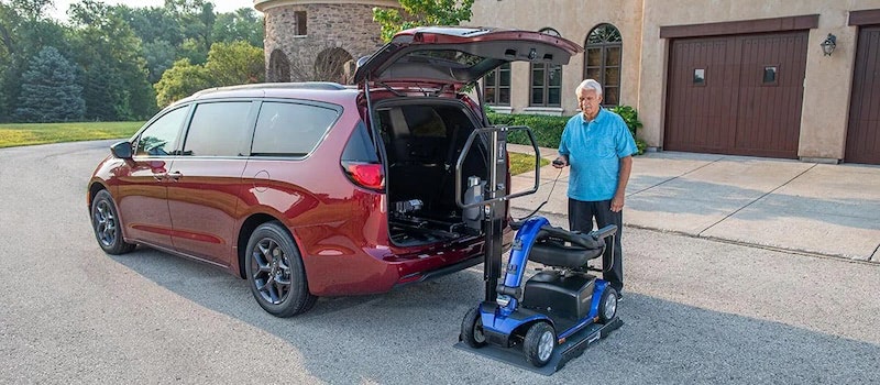 Platform lift with scooter for a van