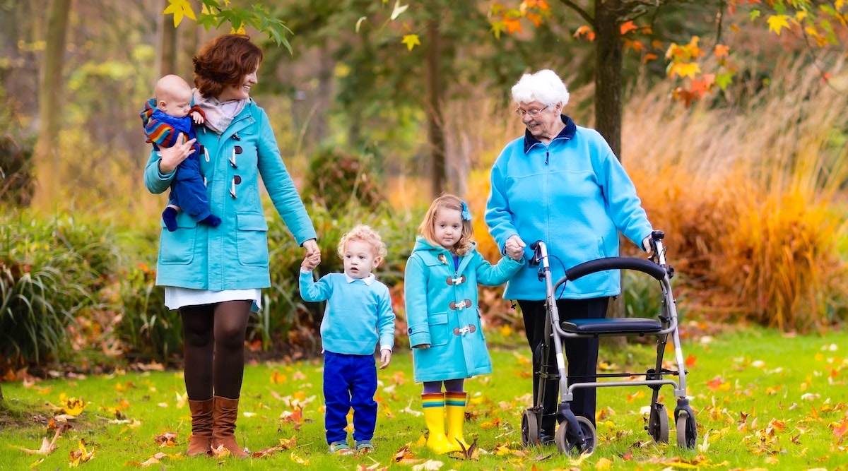 THree generations with grandma using a walker