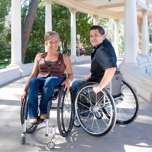 couple young people in wheelchairs